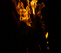 Th flame in a fireplace